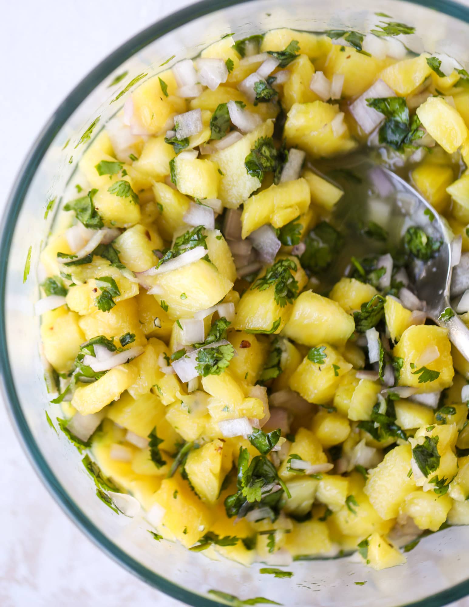Pineapple salsa for roasted chicken! I howsweeteats.com #sticky #chicken