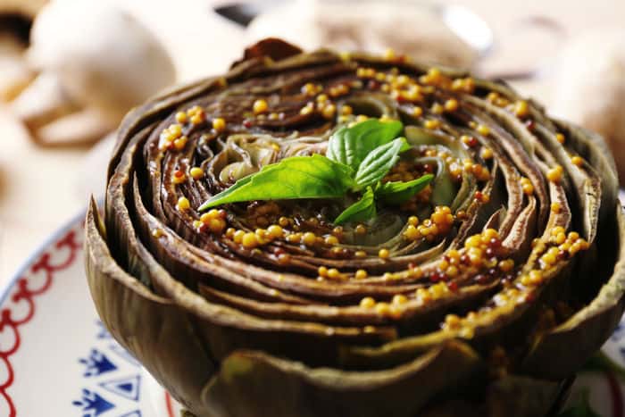 Image of baked artichoke on a plate