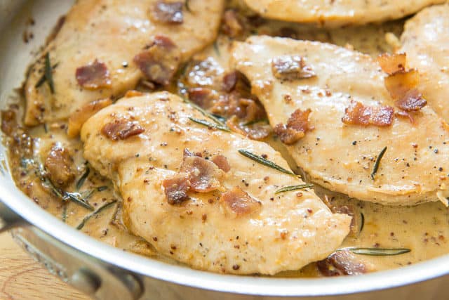 Chicken with Mustard Cream Sauce - In Skillet Topped with Bacon and Rosemary